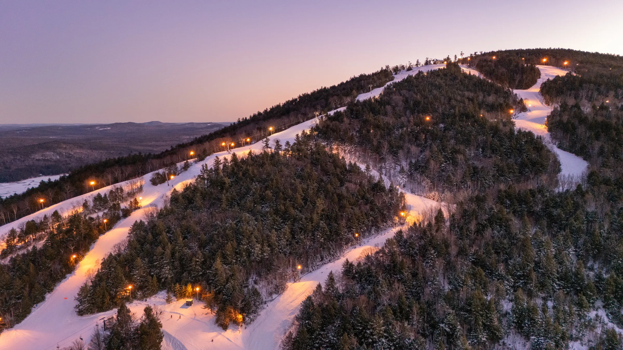 Image of night skiing at Pleasant Mountain